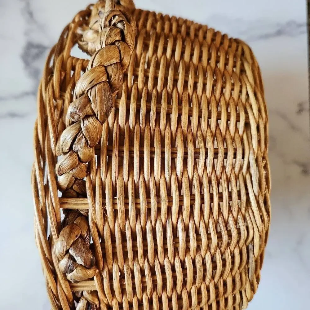 Woven wicker round basket handles various clear glass bottles vintage spice pine